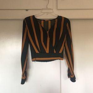 Green and burnt orange blouse